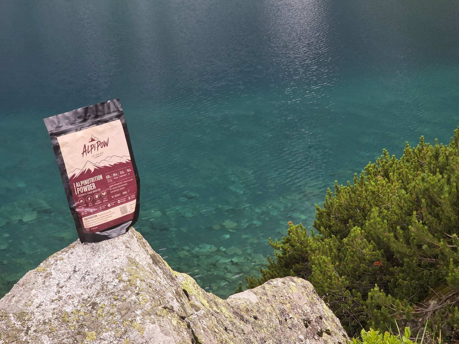 AlpiPow at the water's edge, high in the Tatras
